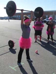 Tanique Plaxen participating in Barbells for Boobs